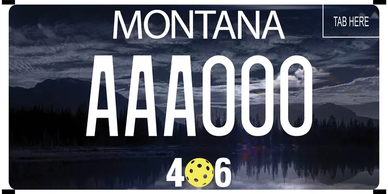 A license plate with white text. A dark photo of mountains, lake, and stormy sky. Text at bottom of plate says 406 with the zero represented by a pickle ball.