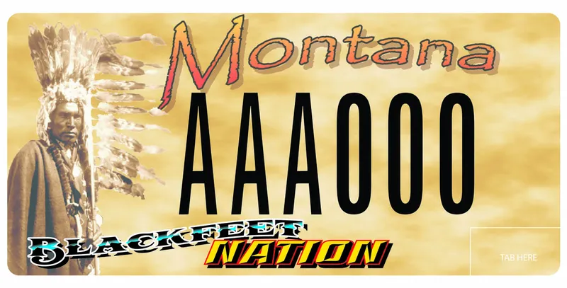 A beige license plate with black, peach, blue, and yellow text. A blackfeet chief on left. Text at bottom says Blackfeet Nation.