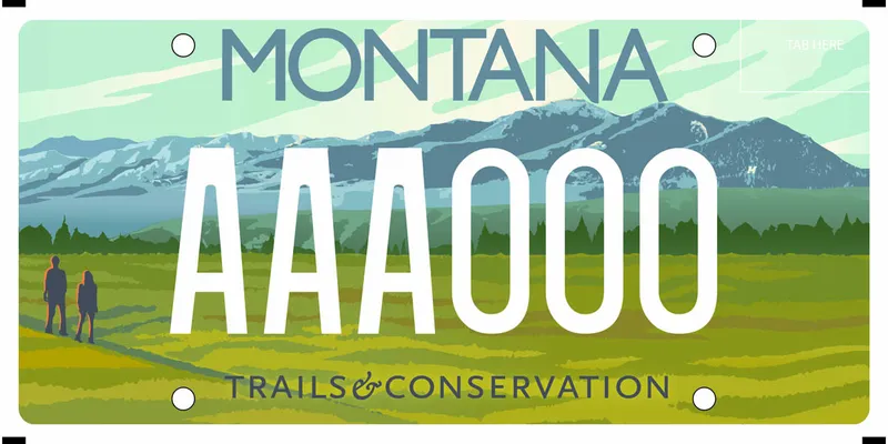 A license plate with white and gray text. Illustration of mountains and two people hiking along valley floor. Bottom says Trails & Conservation.