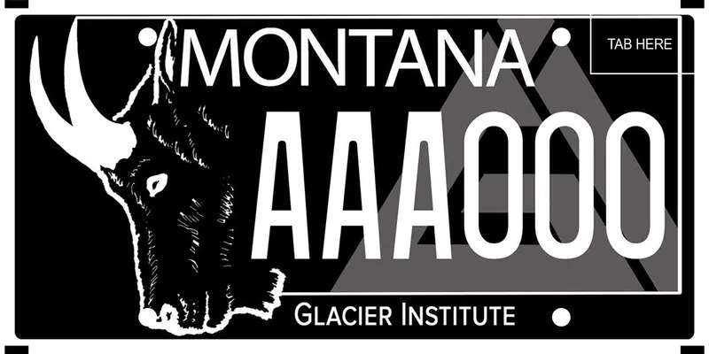 A black license plate with white text. A mountain goat head is on left side. Bottom says Glacier Institute.