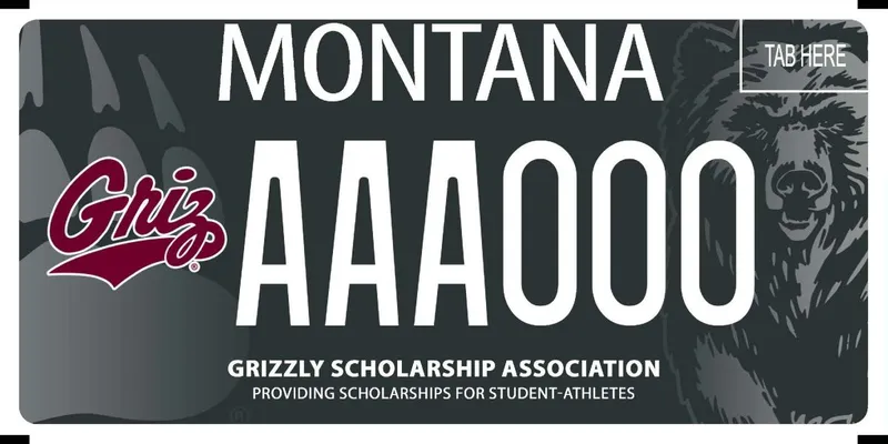 A gray and black license plate with white text. A bear paw is on the left side of plate with maroon Griz name logo over it. A grizzly bear illustration on the right. Bottom says Grizzly Scholarship Association; Providing Scholarships for Student Athletes.