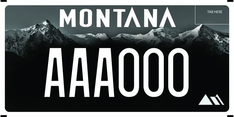 A black license plate with white text. Image of snow covered mountain peaks in background.
