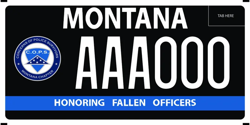A black license plate with white text. Concerns of Police Survivors, Montana Chapter logo on left side. Bottom in blue banner says Honoring Fallen Officers.