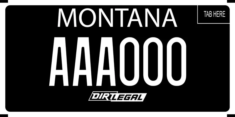 A black license plate with white text. Bottom says Dirt Legal.