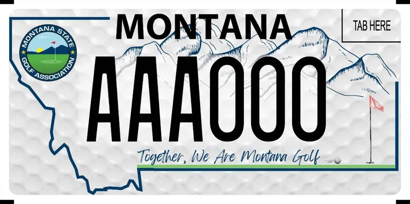 A license plate with a white background with texture similar to a golf ball. Blue outline of the state with illustrated mountains in the distance. Montana State Golf Association logo in upper left corner. A flagstick in a golf hole is in lower right corner. Bottom of plate says Together, We Are Montana Golf.