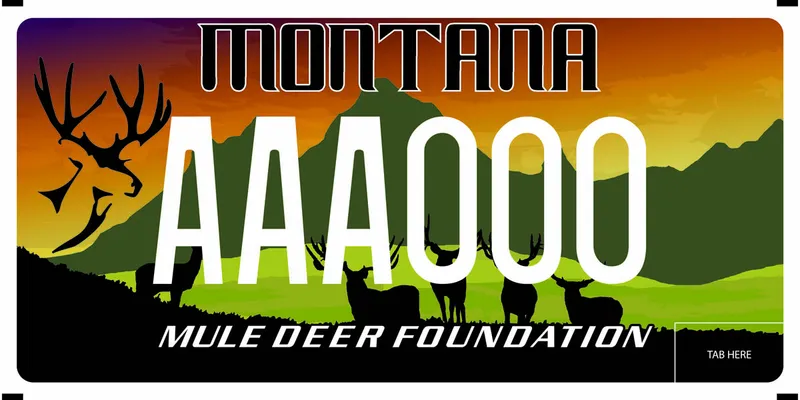 A license plate with white and black text. Illustrated mountain scene with silohuette of mule deer at foothills. Bottom says Mule Deer Foundation.