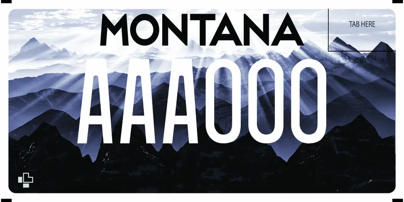 A black and grayscale license plate with a mountain landscape with craggy peaks and sunrays.