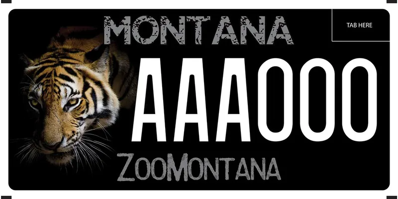 A black license plate with white and gray text. A picture of a siberian tiger is on left. Bottom says Zoo Montana.